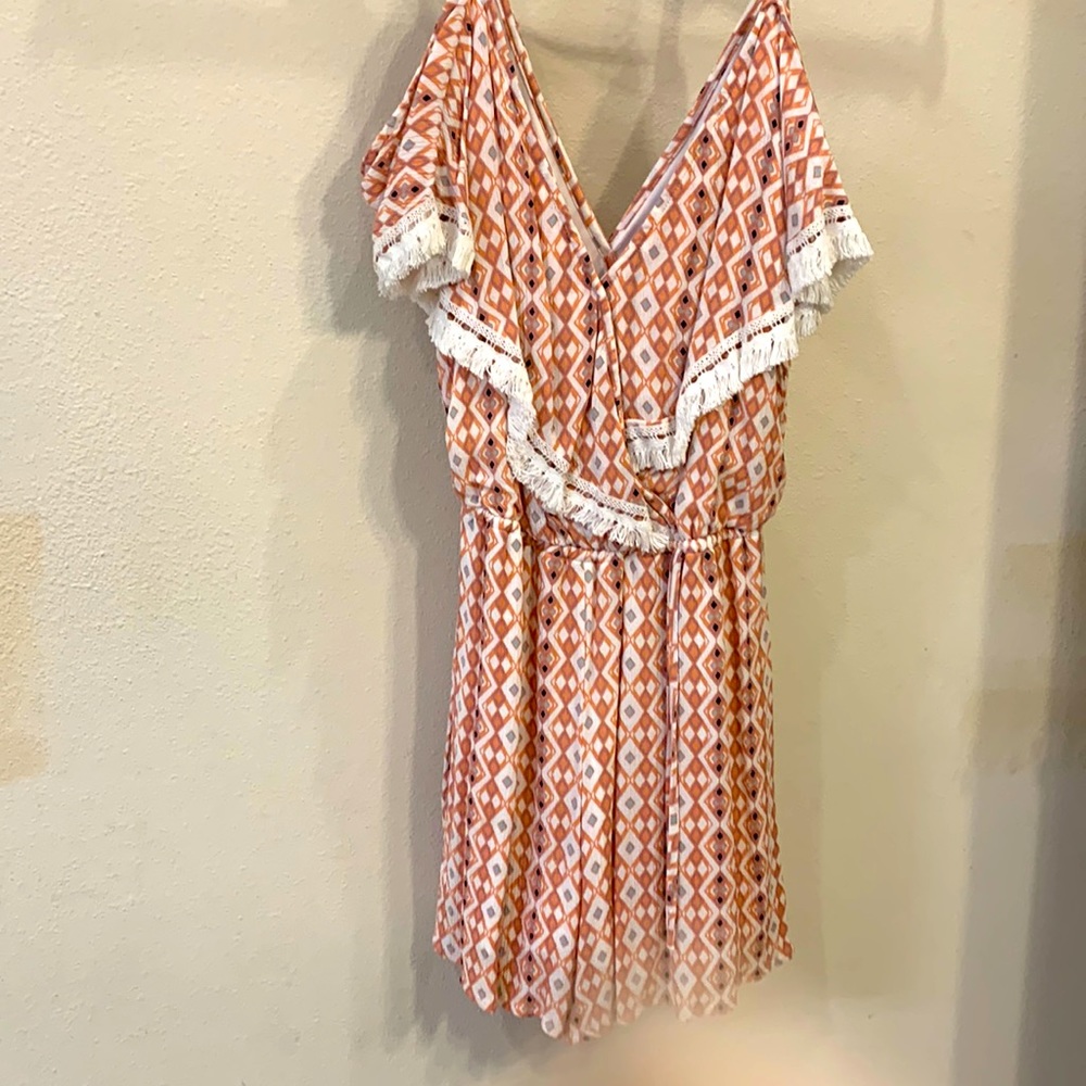 Printed romper with skinny straps and interesting edging